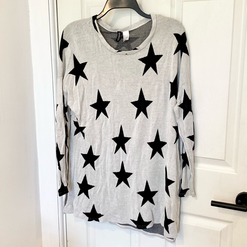 H&M Tunic sweater with side slits.